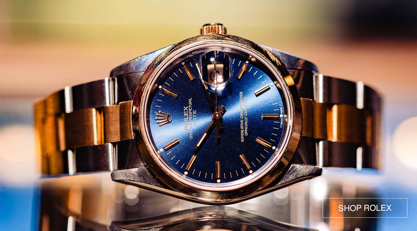 A great looking man’s Rolex SS/18K YG Oyster Perpetual Date ref 15203 circa 1900. Featuring a 34mm diameter case with 18K YG smooth bezel, sapphire crystal, and stunning original blue dial with gold indexes and hands. Fitted with original Rolex SS/18K YG heavy Oyster bracelet.